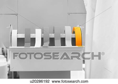 Stock Image - Rolls of labeling tape in laboratory. Fotosearch