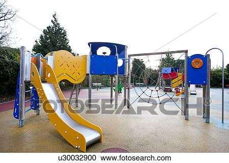 Slide and climbing web in children's playground View Large Photo Image Stock Image - Slide and climbing web in children's playground. Fotosearch