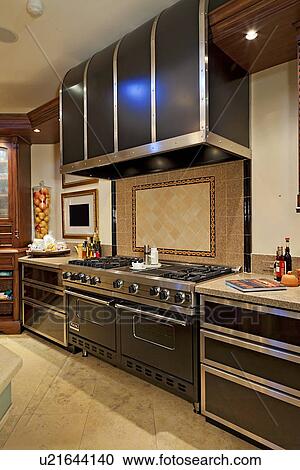 Stainless steel Stove cooker in kitchen View Large Photo Image Stock Image - Stainless steel Stove cooker in kitchen. Fotosearch