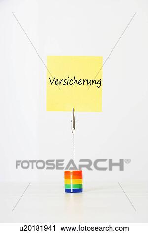 Sticky notepaper with German text "Versicherung" (Insurance) clipped to a multicolored card holder View Large Photo Image Stock Image - Sticky notepaper with German text "Versicherung" (Insurance) clipped to a multicolored card holder. Fotosearch
