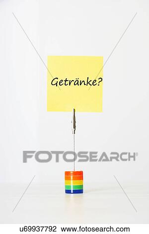 Sticky notepaper with German text "Getränke? " (drinks) clipped to a multicolored card holder View Large Photo Image Stock Image - Sticky notepaper with German text "Getränke? " (drinks) clipped to a multicolored card holder. Fotosearch