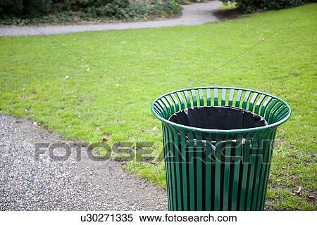 Trash can in a park View Large Photo Image Stock Photography - Trash can in a park. Fotosearch