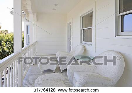 Stock Photo - Two chairs on empty deck. Fotosearch