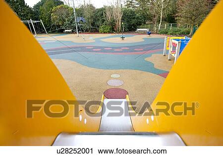 View down a slide in a playground View Large Photo Image Stock Image - View down a slide in a playground. Fotosearch
