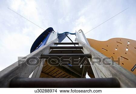 Picture - View up a ladder in a children's playground. Fotosearch