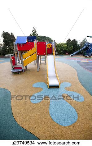Picture - Wide view of slide and painted splash at base. Fotosearch