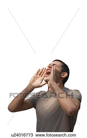 Stock Image - Young man is casuals screaming over white background. Fotosearch