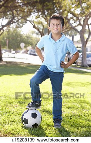 Stock Photo - Boy Posing With Soccer ball. Fotosearch