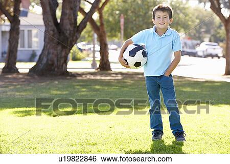 Boy Posing With Soccer ball View Large Photo Image Stock Photograph - Boy Posing With Soccer ball. Fotosearch