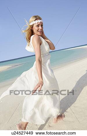 Stock Photo - Bride At Beautiful Beach Wedding. Fotosearch