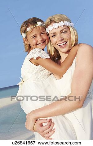 Bride With Bridesmaid At Beautiful Beach Wedding View Large Photo Image Stock Photo - Bride With Bridesmaid At Beautiful Beach Wedding. Fotosearch