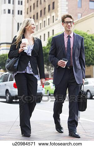 Businessman And Businesswoman In Street With Takeaway Coffee View Large Photo Image Stock Image - Businessman And Businesswoman In Street With Takeaway Coffee. Fotosearch
