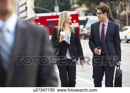 Businessman And Businesswoman In Street With Takeaway Coffee View Large Photo Image Stock Image - Businessman And Businesswoman In Street With Takeaway Coffee. Fotosearch
