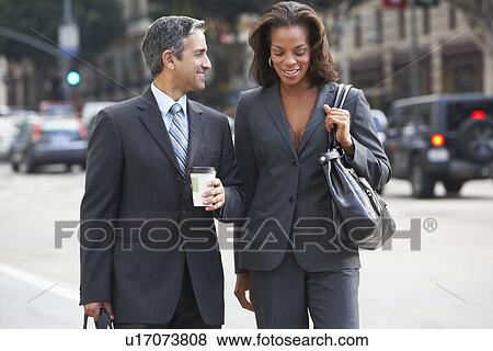 Businessman And Businesswoman In Street With Takeaway Coffee View Large Photo Image Stock Photo - Businessman And Businesswoman In Street With Takeaway Coffee. Fotosearch