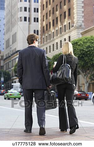 Businessman And Businesswoman In Street With Takeaway Coffee View Large Photo Image Stock Photo - Businessman And Businesswoman In Street With Takeaway Coffee. Fotosearch