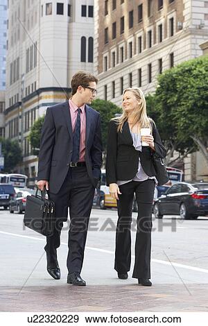 Businessman And Businesswoman In Street With Takeaway Coffee View Large Photo Image Stock Photo - Businessman And Businesswoman In Street With Takeaway Coffee. Fotosearch
