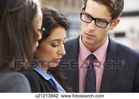 Businessman And Businesswomen Having Discussion In Street View Large Photo Image Stock Image - Businessman And Businesswomen Having Discussion In Street. Fotosearch