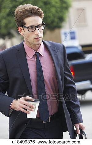 Businessman Hurrying Along Street Holding Takeaway Coffee View Large Photo Image Stock Photograph - Businessman Hurrying Along Street Holding Takeaway Coffee. Fotosearch