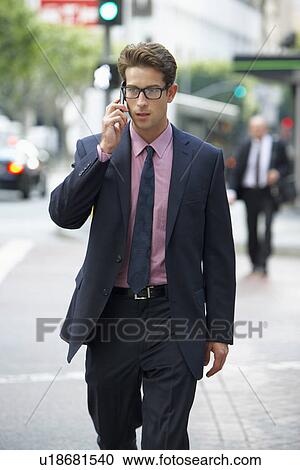 Businessman Outside Office On Mobile Phone View Large Photo Image Stock Image - Businessman Outside Office On Mobile Phone. Fotosearch