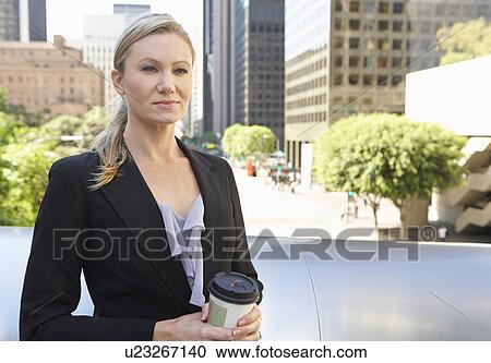 Businesswoman Drinking Takeaway Coffee Outside Office View Large Photo Image Stock Image - Businesswoman Drinking Takeaway Coffee Outside Office. Fotosearch