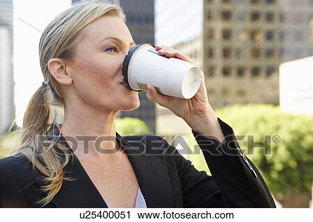 Businesswoman Drinking Takeaway Coffee Outside Office View Large Photo Image Stock Image - Businesswoman Drinking Takeaway Coffee Outside Office. Fotosearch