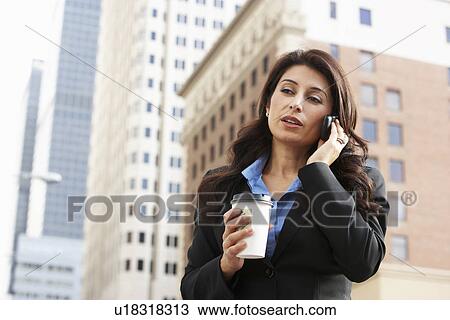 Businesswoman Outside Office On Mobile Phone View Large Photo Image Stock Image - Businesswoman Outside Office On Mobile Phone. Fotosearch