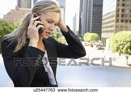 Businesswoman Outside Office On Mobile Phone View Large Photo Image Stock Image - Businesswoman Outside Office On Mobile Phone. Fotosearch