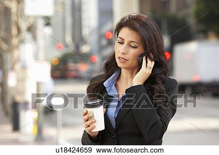 Businesswoman Outside Office On Mobile Phone View Large Photo Image Stock Photo - Businesswoman Outside Office On Mobile Phone. Fotosearch