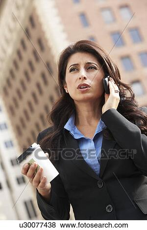 Businesswoman Outside Office On Mobile Phone View Large Photo Image Stock Photo - Businesswoman Outside Office On Mobile Phone. Fotosearch