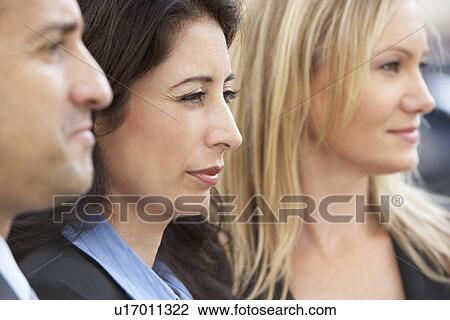 Stock Image - Close Up Of Three Business Colleagues. Fotosearch