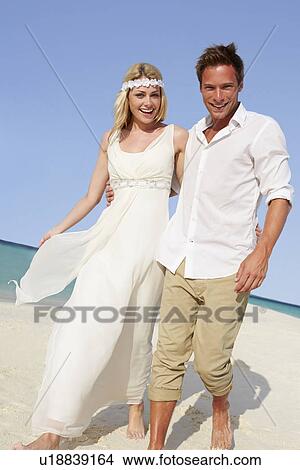 Picture - Couple At Beautiful Beach Wedding. Fotosearch