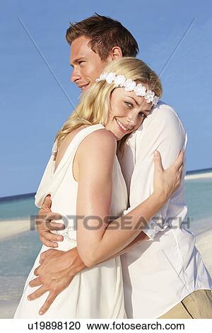 Couple At Beautiful Beach Wedding View Large Photo Image Stock Image - Couple At Beautiful Beach Wedding. Fotosearch