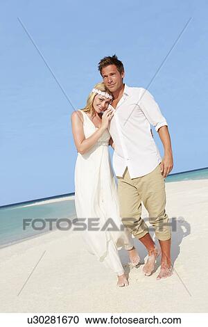 Couple At Beautiful Beach Wedding View Large Photo Image Stock Image - Couple At Beautiful Beach Wedding. Fotosearch