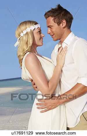 Couple At Beautiful Beach Wedding View Large Photo Image Stock Photo - Couple At Beautiful Beach Wedding. Fotosearch