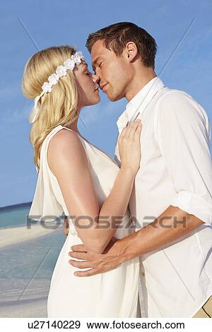 Couple At Beautiful Beach Wedding View Large Photo Image Stock Photo - Couple At Beautiful Beach Wedding. Fotosearch