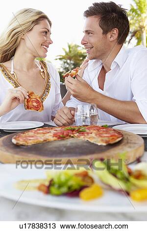 Couple Enjoying Meal In Outdoor Restaurant View Large Photo Image Stock Image - Couple Enjoying Meal In Outdoor Restaurant. Fotosearch