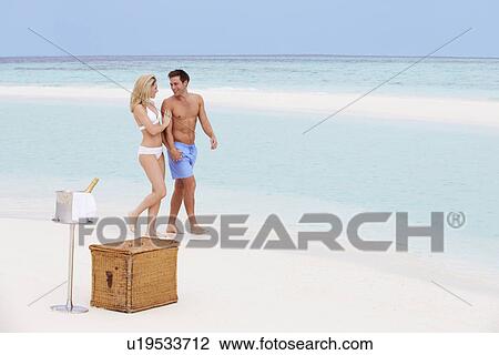 Couple On Beach With Luxury Champagne Picnic View Large Photo Image Stock Image - Couple On Beach With Luxury Champagne Picnic. Fotosearch