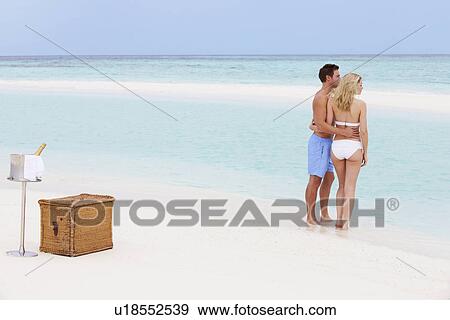 Couple On Beach With Luxury Champagne Picnic View Large Photo Image Stock Photo - Couple On Beach With Luxury Champagne Picnic. Fotosearch