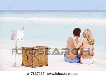 Couple On Beach With Luxury Champagne Picnic View Large Photo Image Stock Photography - Couple On Beach With Luxury Champagne Picnic. Fotosearch