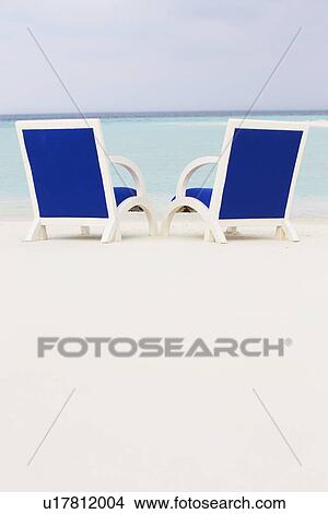 Empty Chairs On Beautiful Tropical Beach View Large Photo Image Picture - Empty Chairs On Beautiful Tropical Beach. Fotosearch
