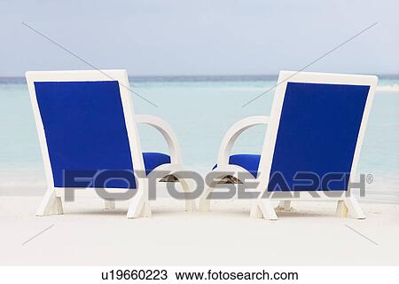 Empty Chairs On Beautiful Tropical Beach View Large Photo Image Stock Image - Empty Chairs On Beautiful Tropical Beach. Fotosearch