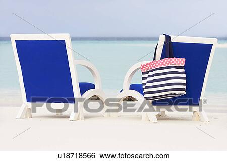 Empty Chairs On Beautiful Tropical Beach View Large Photo Image Stock Photograph - Empty Chairs On Beautiful Tropical Beach. Fotosearch