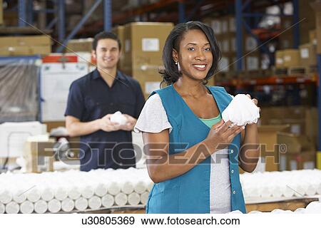 Factory Worker Checking Goods On Production Line View Large Photo Image Stock Photo - Factory Worker Checking Goods On Production Line. Fotosearch