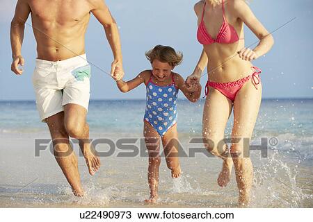Family Having Fun In Sea On Beach Holiday View Large Photo Image Stock Image - Family Having Fun In Sea On Beach Holiday. Fotosearch