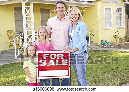Family Standing By For Sale Sign Outside Home View Large Photo Image Stock Photo - Family Standing By For Sale Sign Outside Home. Fotosearch