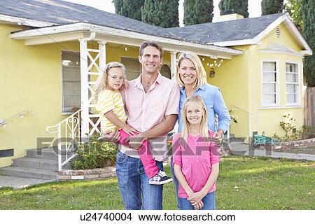 Family Standing Outside Suburban Home View Large Photo Image Picture - Family Standing Outside Suburban Home. Fotosearch