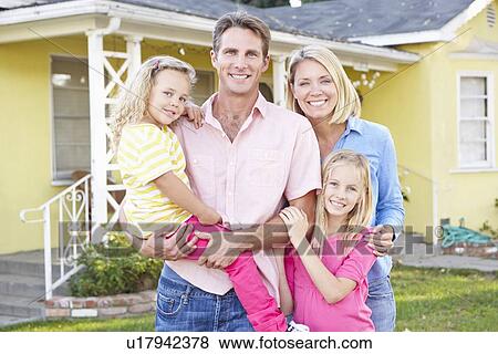 Family Standing Outside Suburban Home View Large Photo Image Stock Photo - Family Standing Outside Suburban Home. Fotosearch