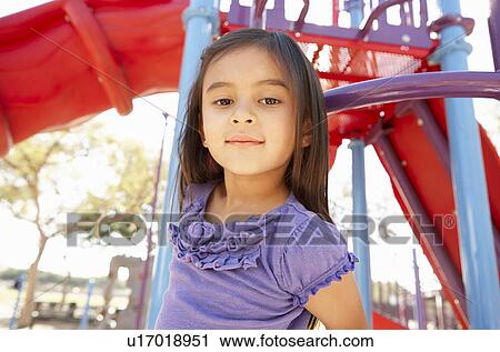 Girl On Climbing Frame In Park View Large Photo Image Stock Image - Girl On Climbing Frame In Park. Fotosearch