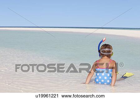Girl Sitting On Beach Wearing Snorkel And Flippers View Large Photo Image Stock Image - Girl Sitting On Beach Wearing Snorkel And Flippers. Fotosearch