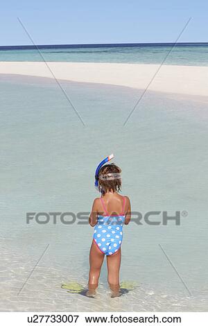 Girl Standing On Beach Wearing Snorkel And Flippers View Large Photo Image Stock Photo - Girl Standing On Beach Wearing Snorkel And Flippers. Fotosearch